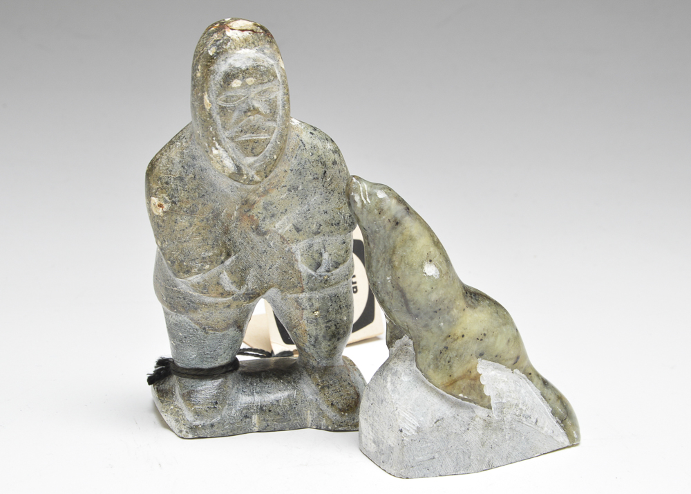 Pair of Hand-Carved Stone Figurines