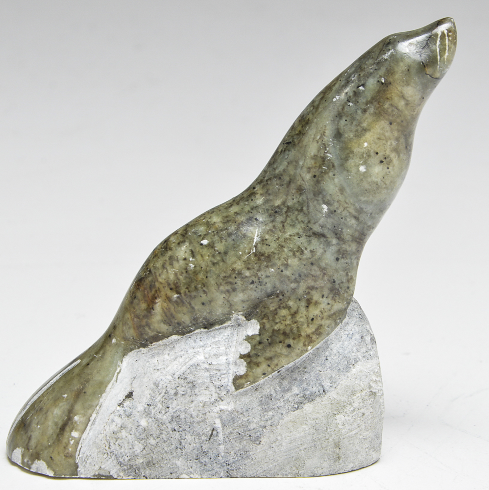 Pair of Hand-Carved Stone Figurines