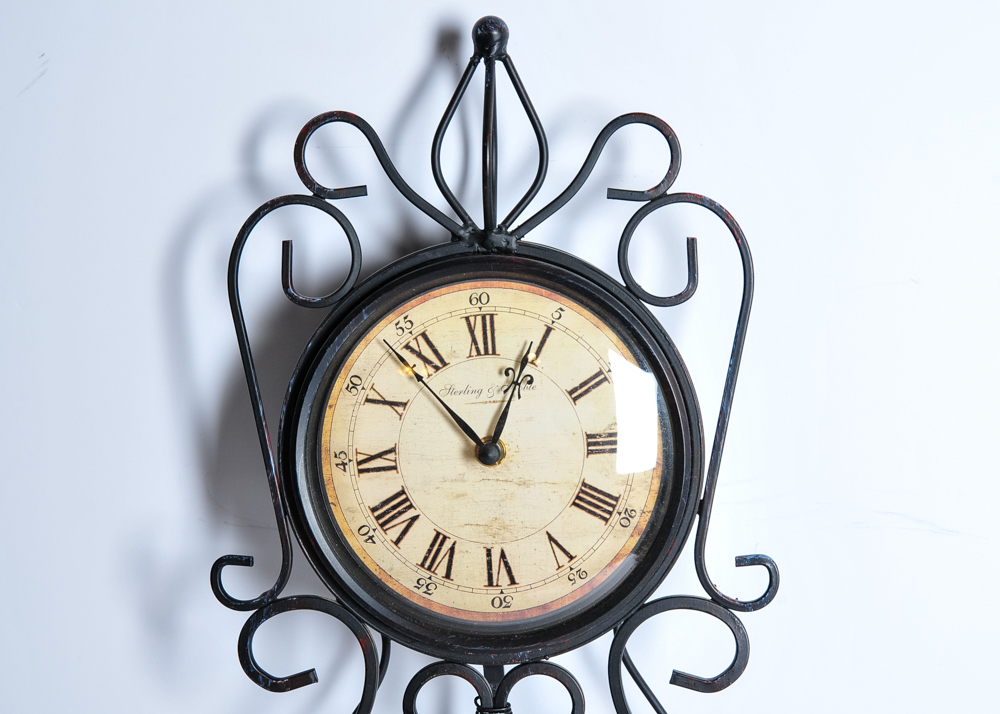 Black Wrought Iron Sterling and Noble Wall Clock