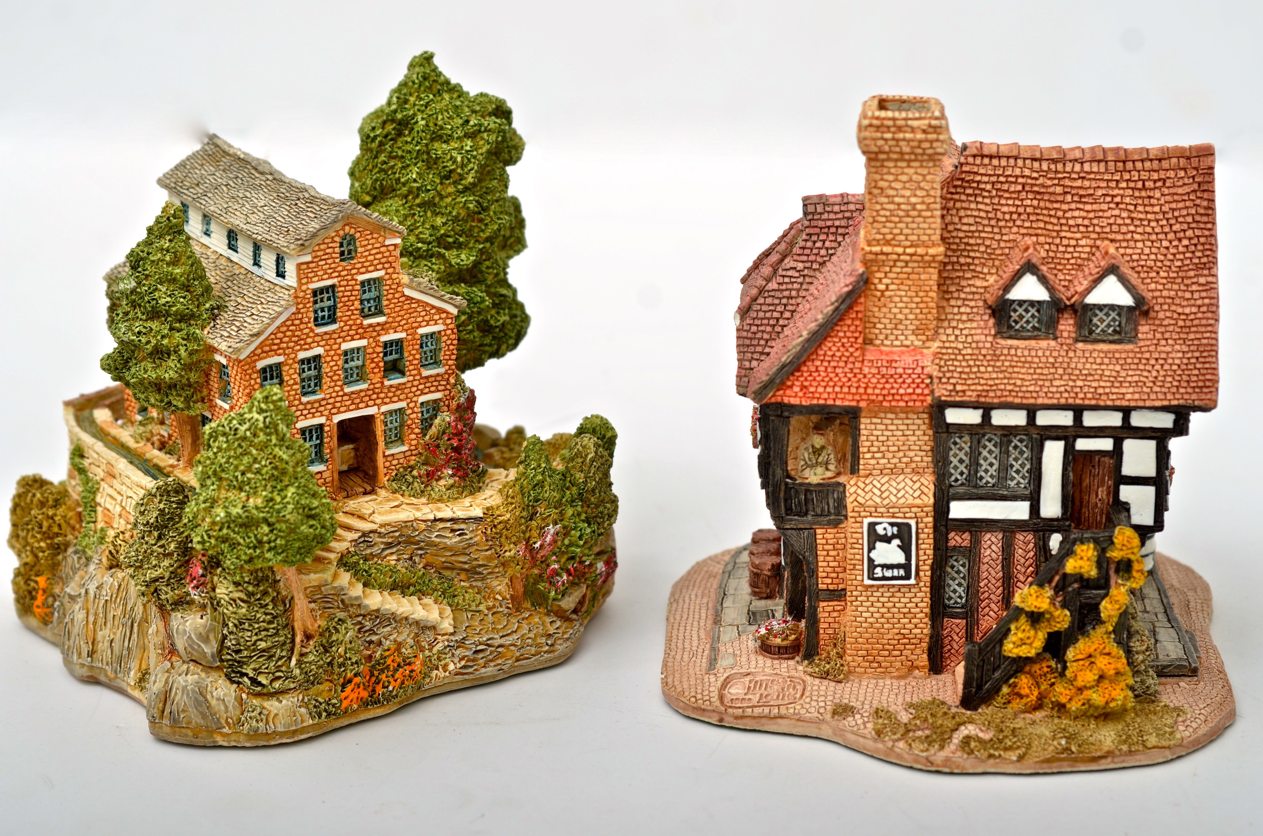 A Collection of Lilliput Lane Collectibles