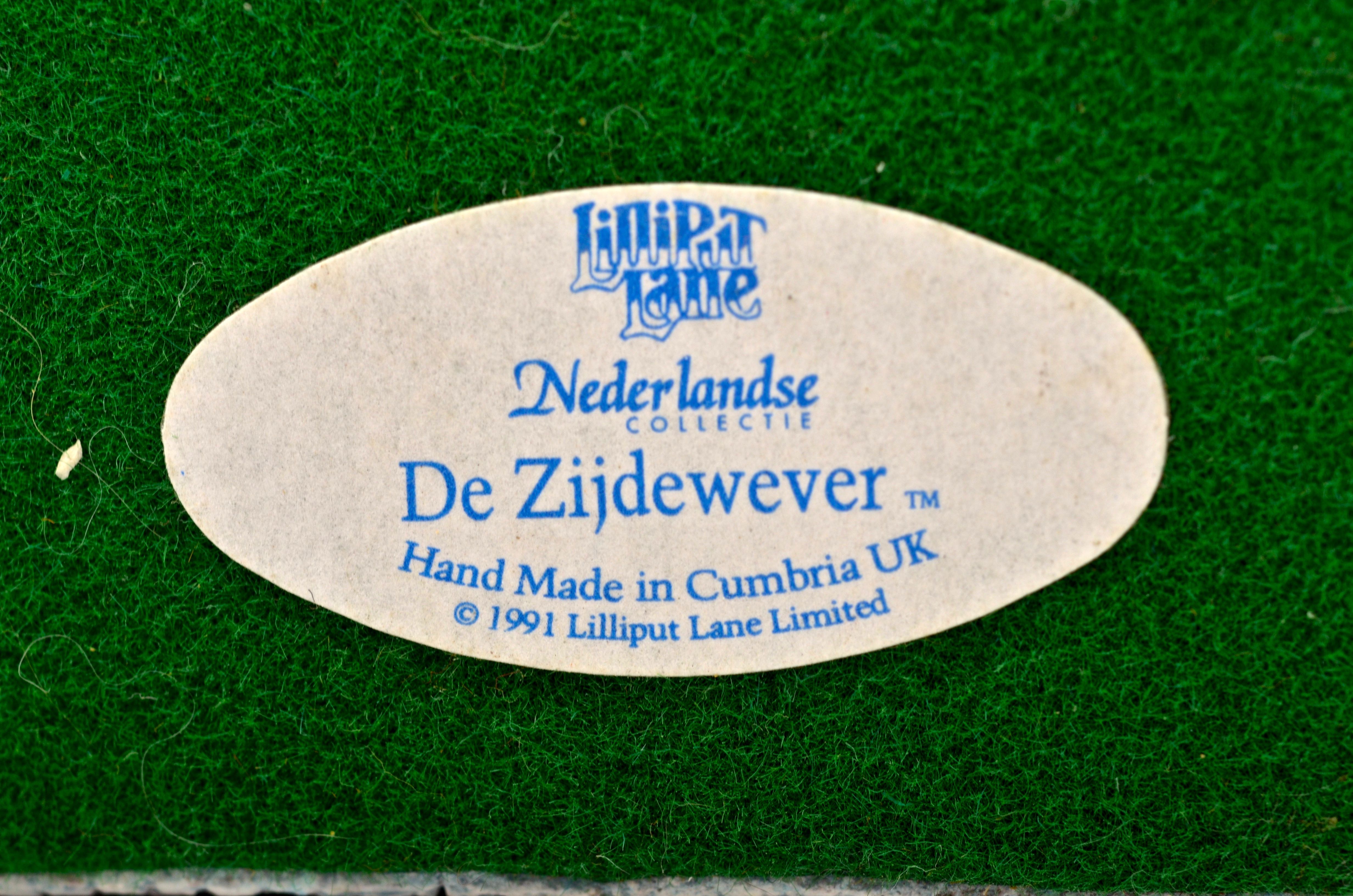 A Collection of Lilliput Lane Collectibles