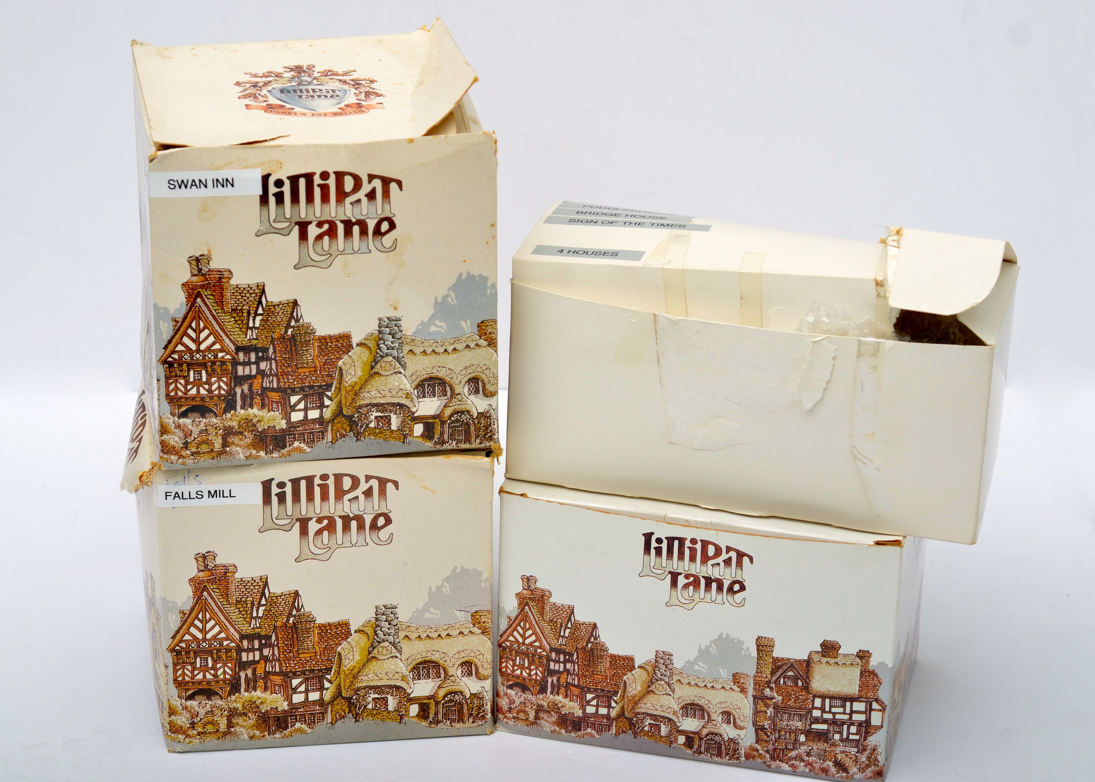 A Collection of Lilliput Lane Collectibles