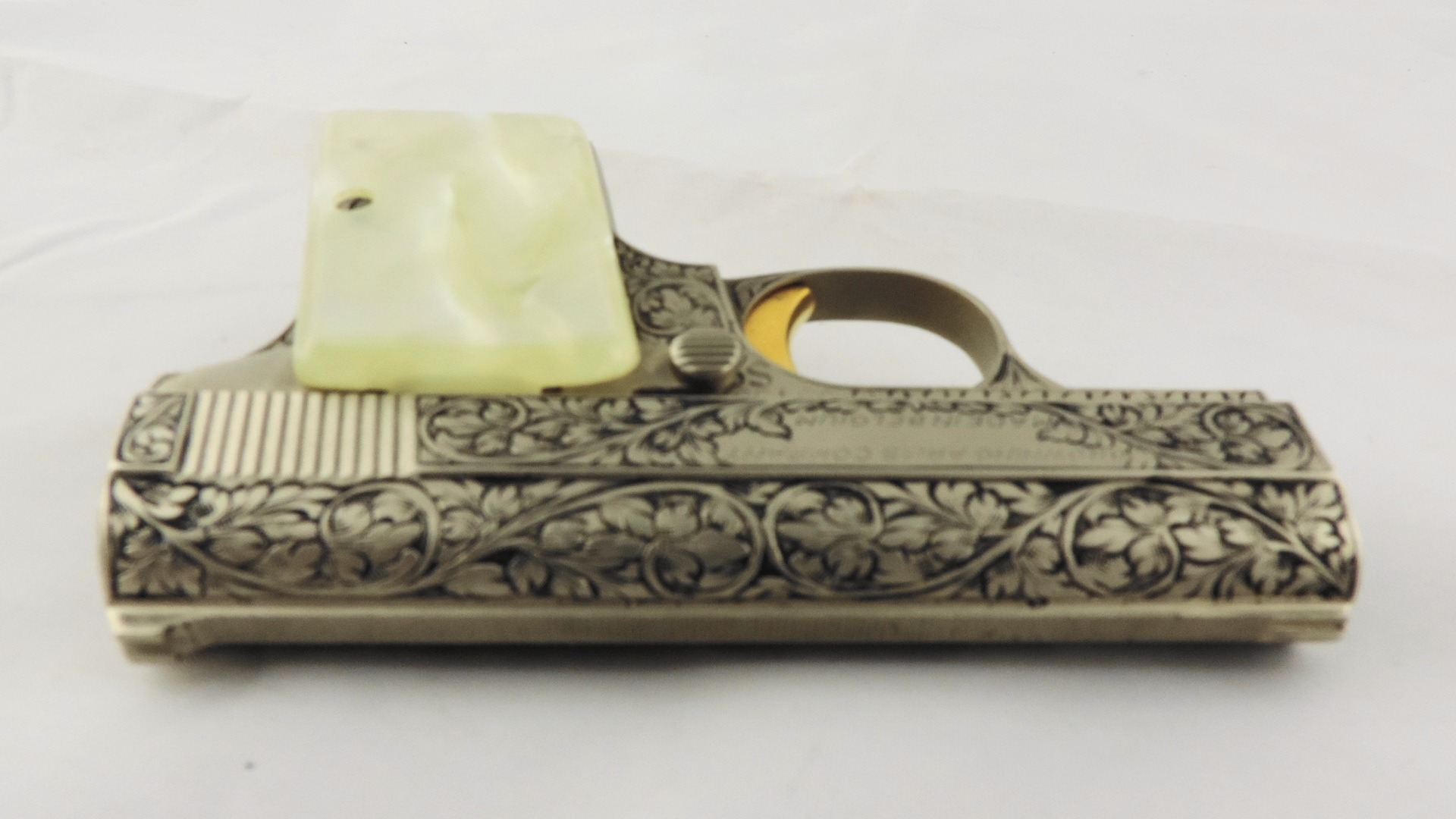 Baby Browning with Renaissance Engraving and Simulated Pearl Grip