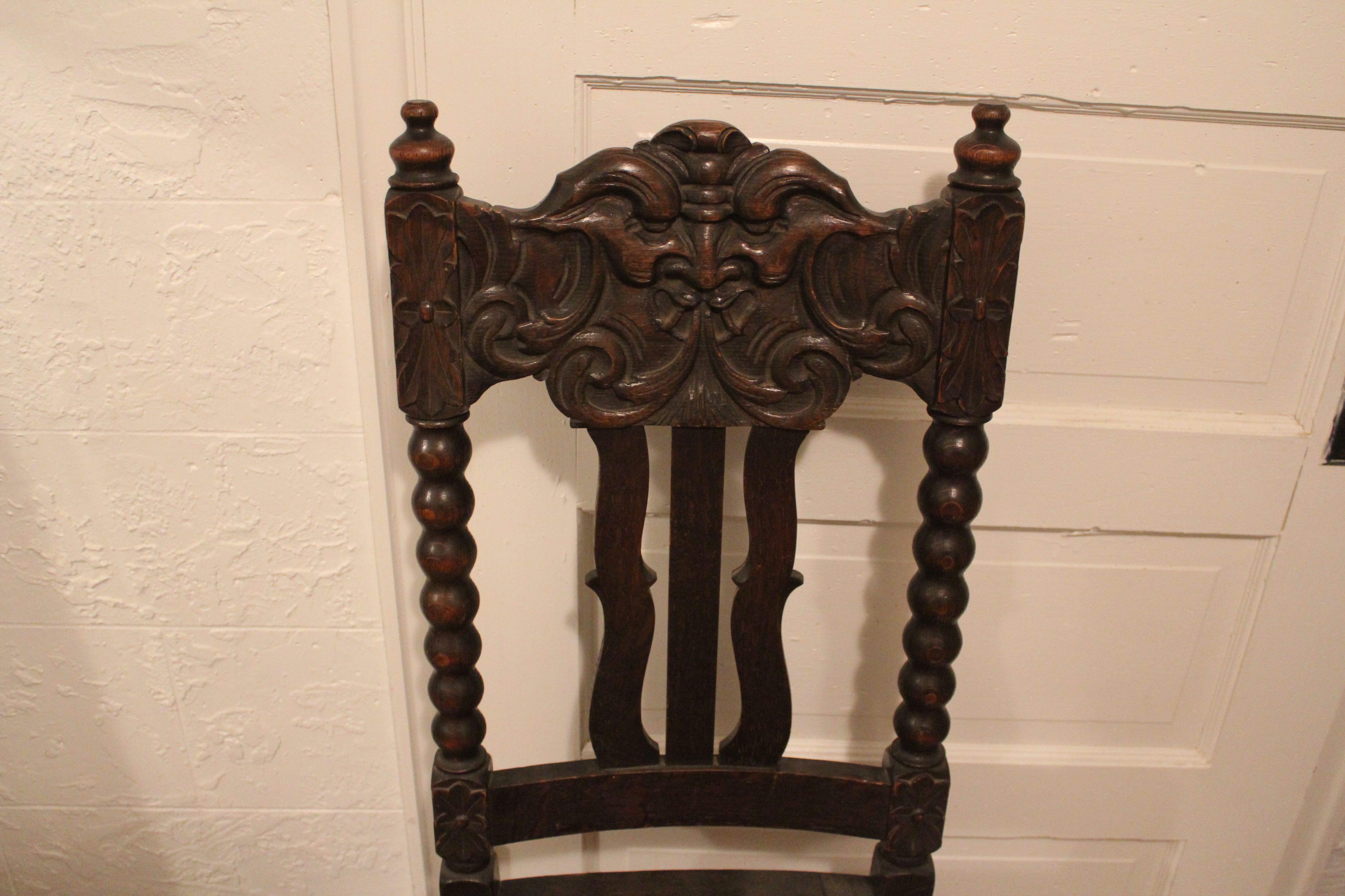 Antique Oak "North Wind" Face Chair