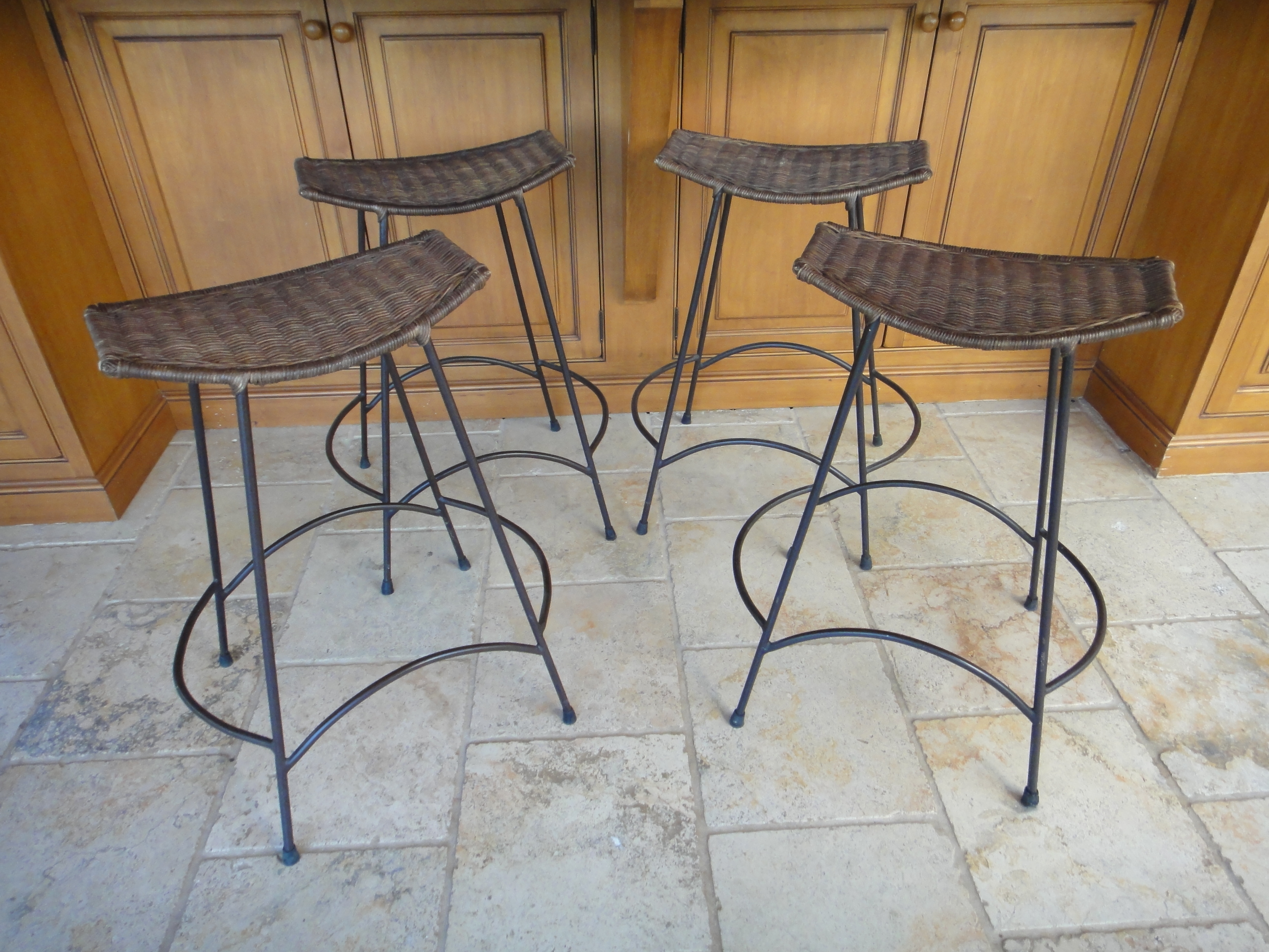 Four Vintage Wrought Iron Wicker Bar Stools