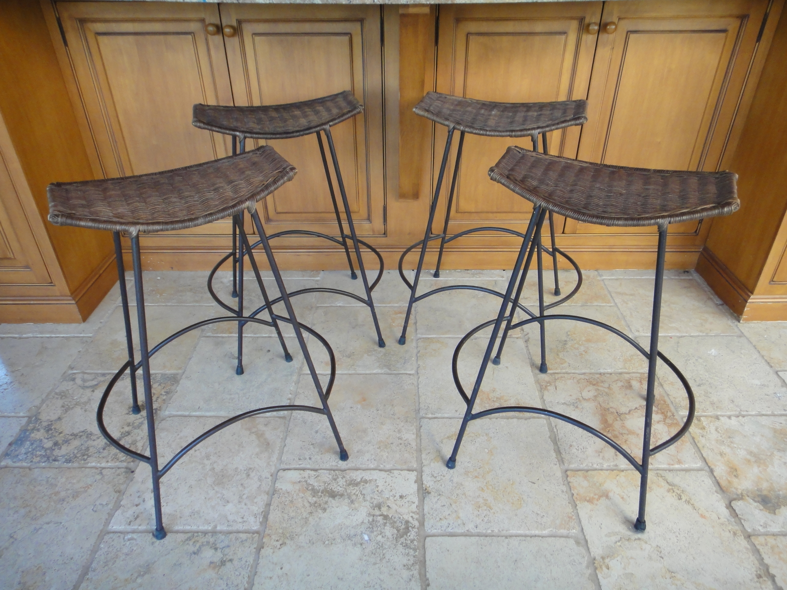 Four Vintage Wrought Iron Wicker Bar Stools