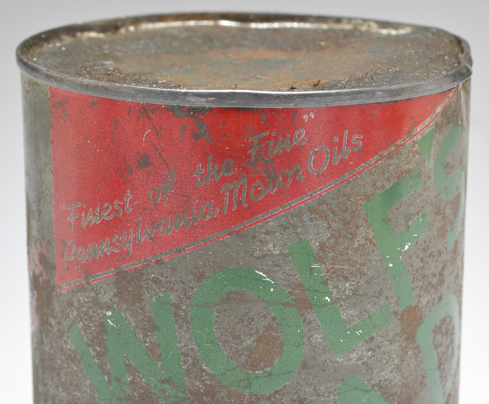A Vintage Wolf's Head Motor Oil Can