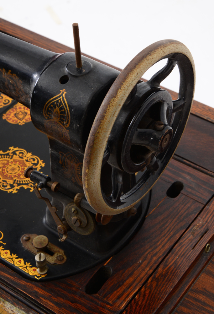 Antique Steinkamp Sewing Machine in Oak Table
