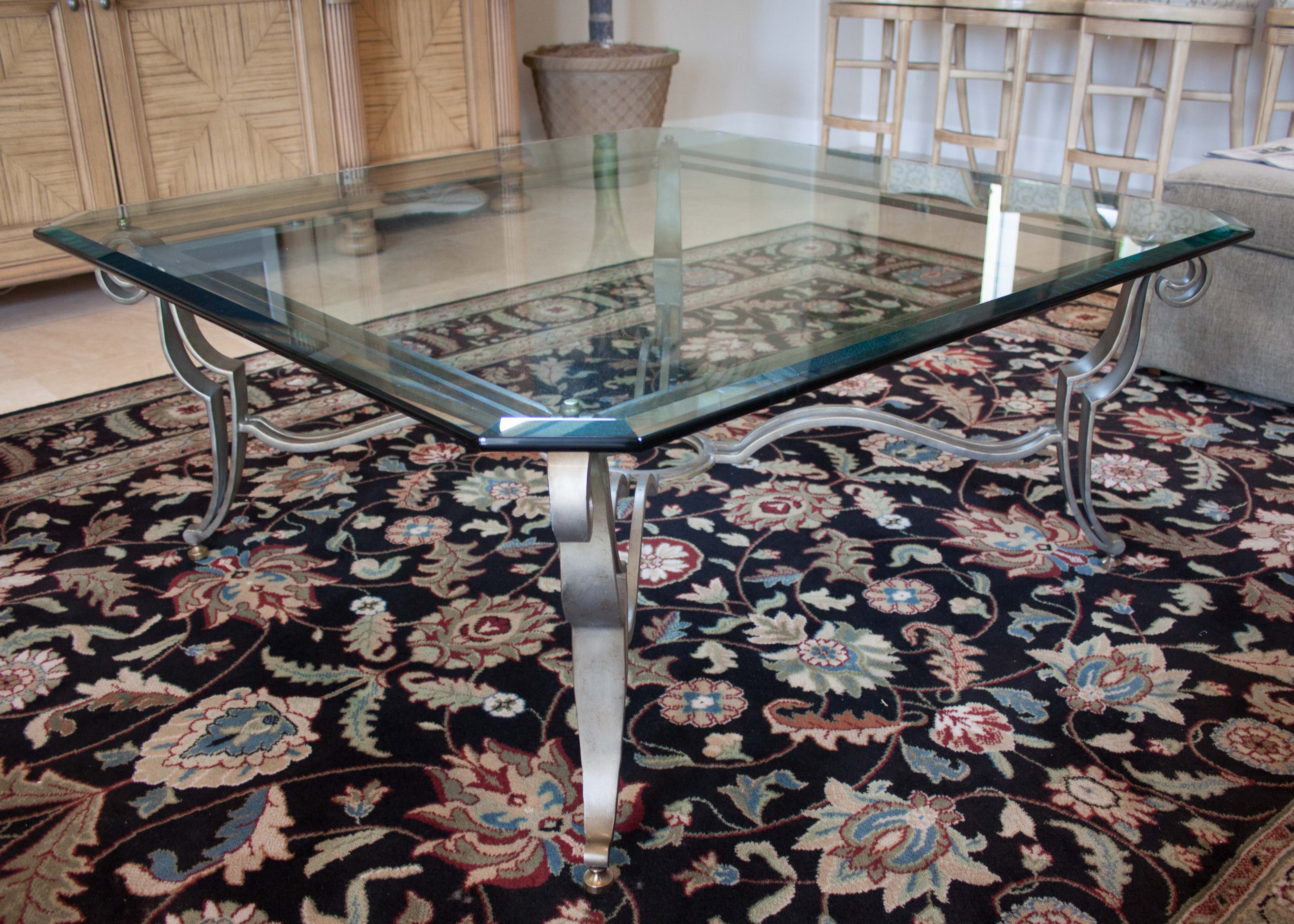 Glass Coffee Table with Scrolling Metal Base