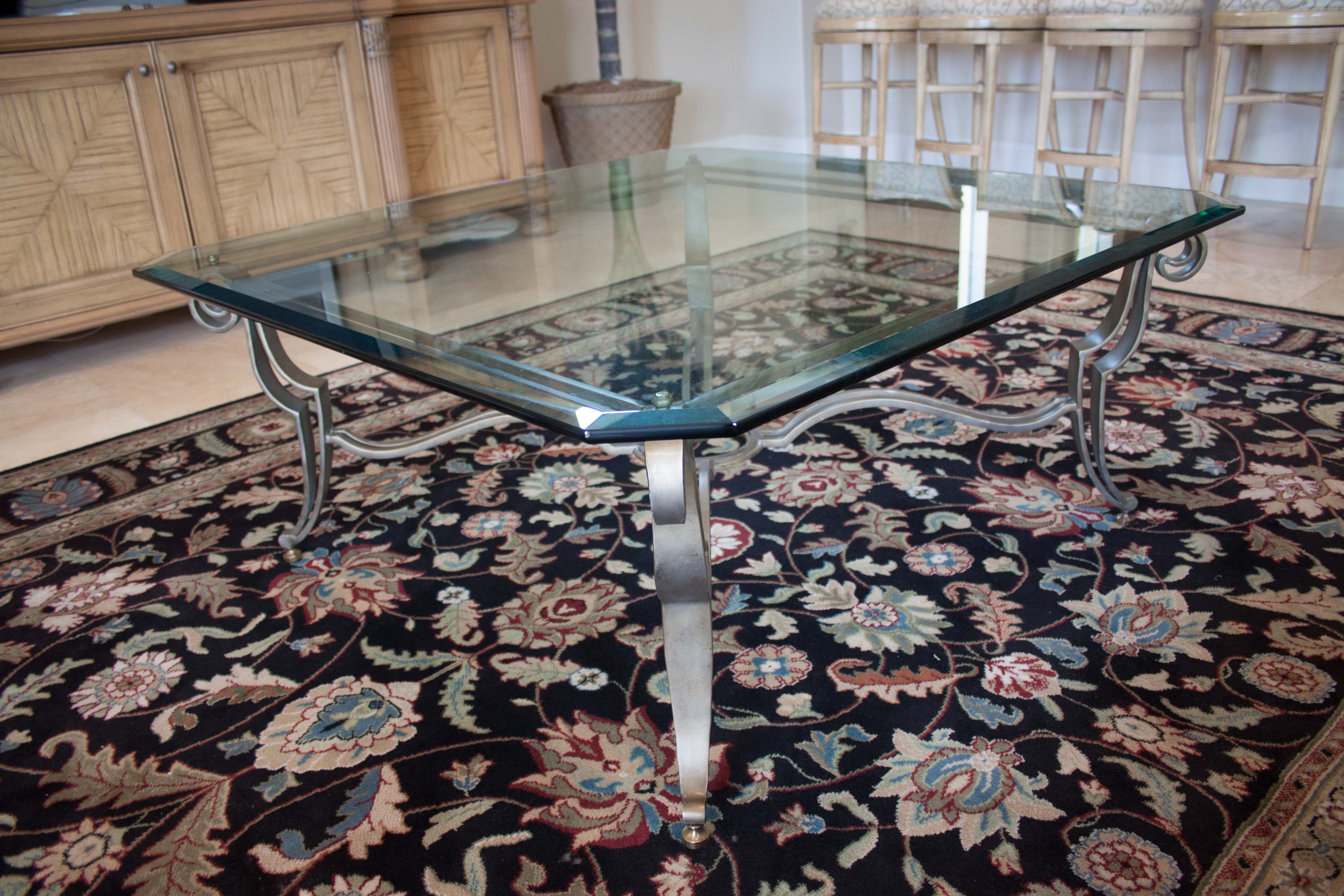 Glass Coffee Table with Scrolling Metal Base