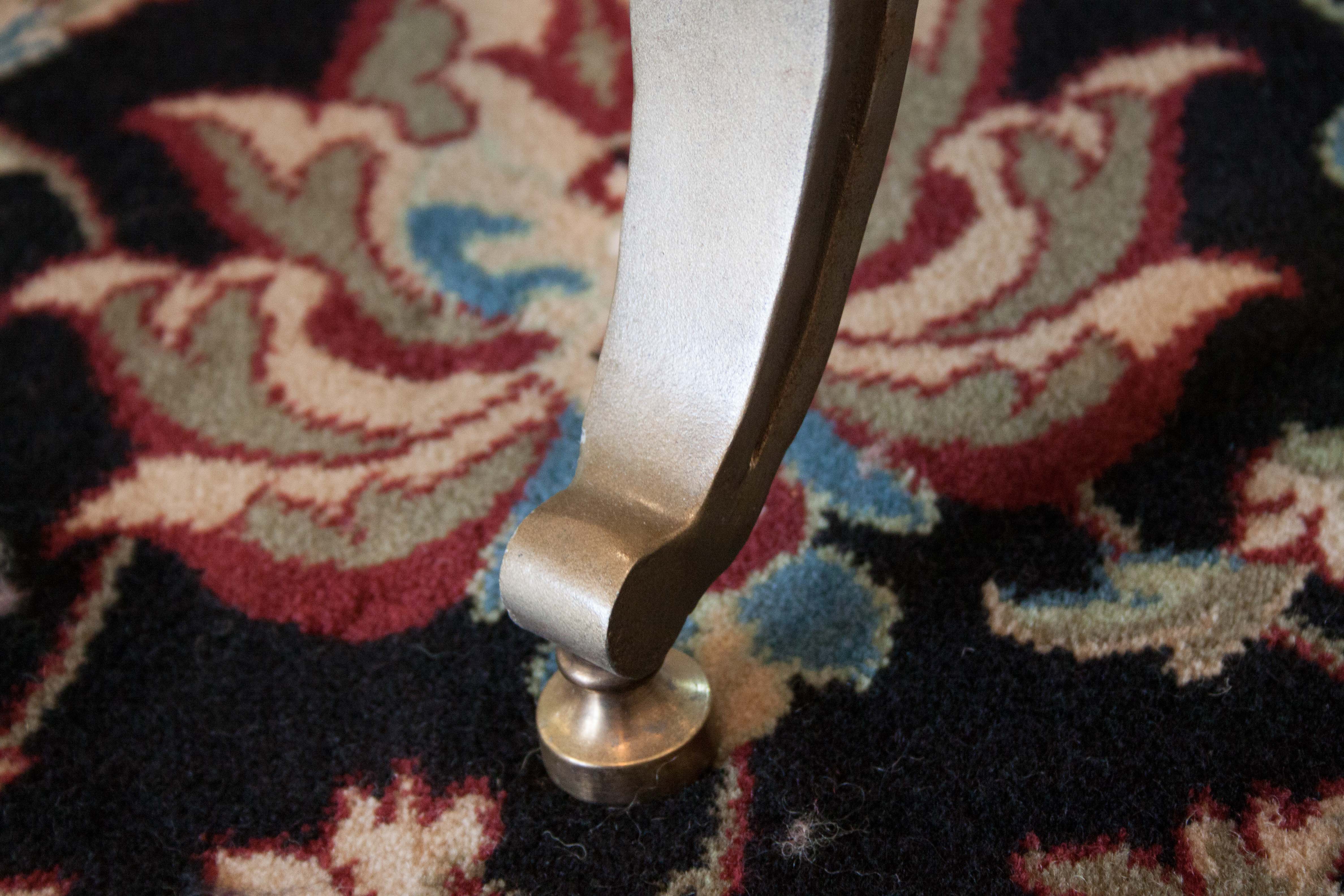 Glass Coffee Table with Scrolling Metal Base