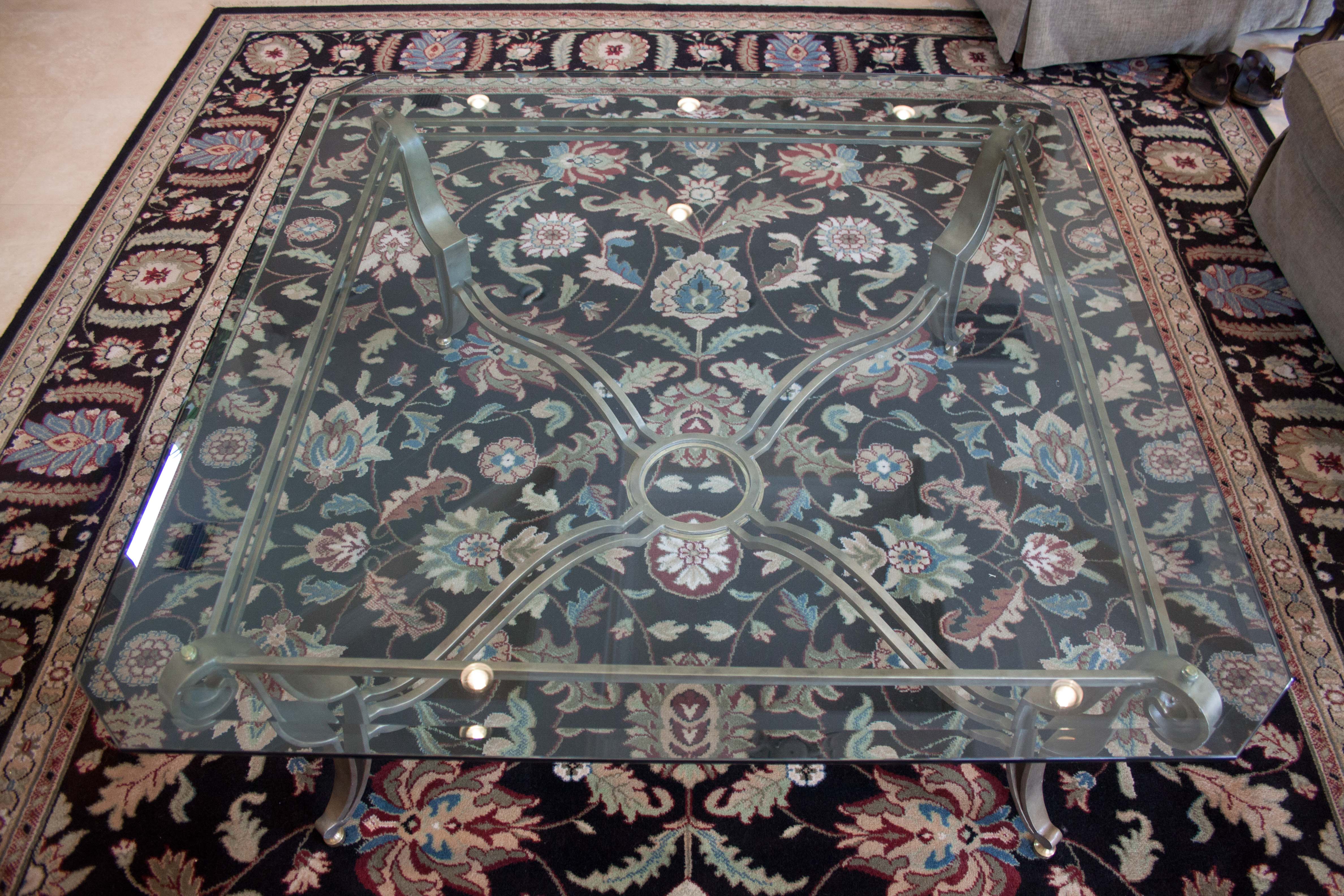 Glass Coffee Table with Scrolling Metal Base