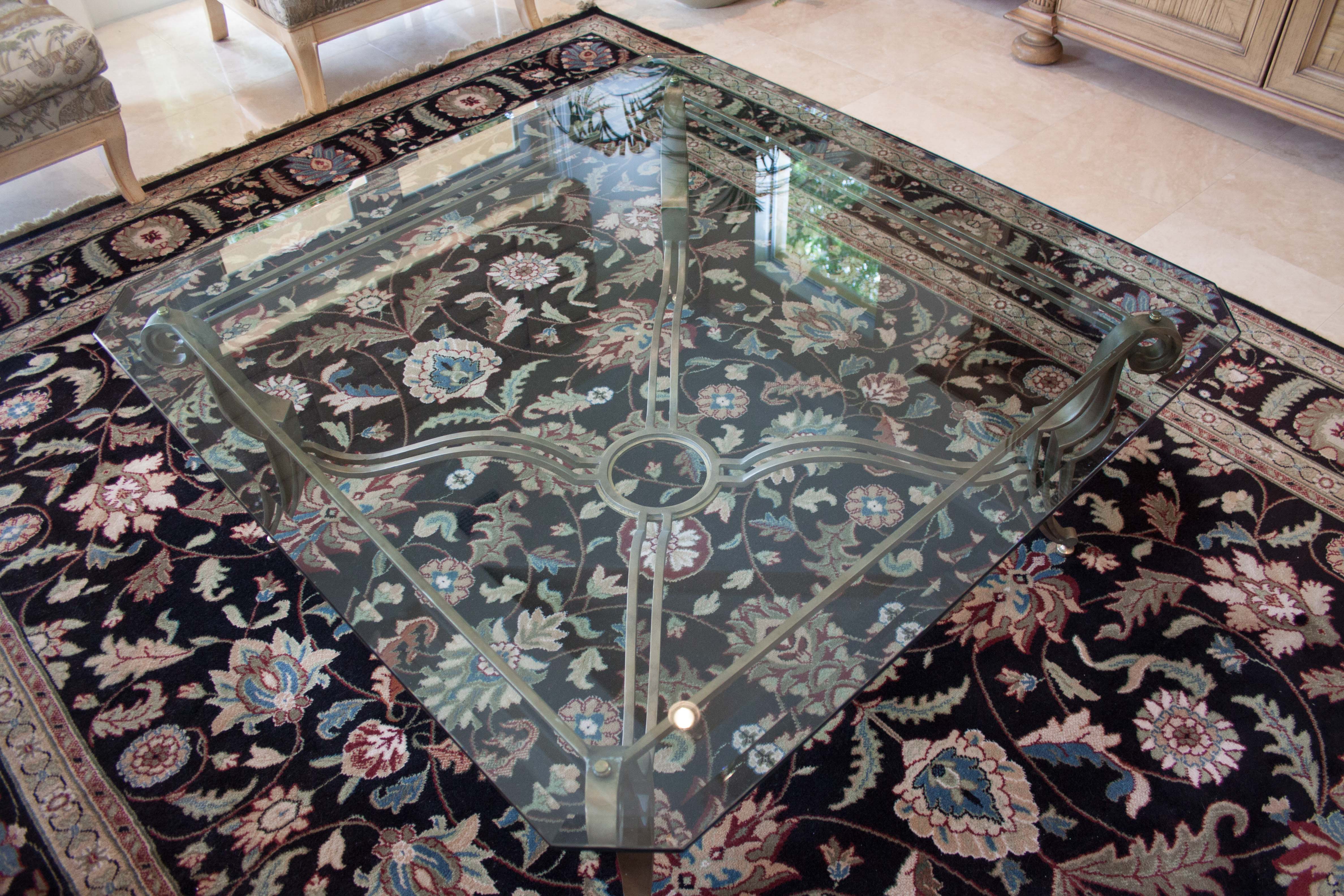 Glass Coffee Table with Scrolling Metal Base