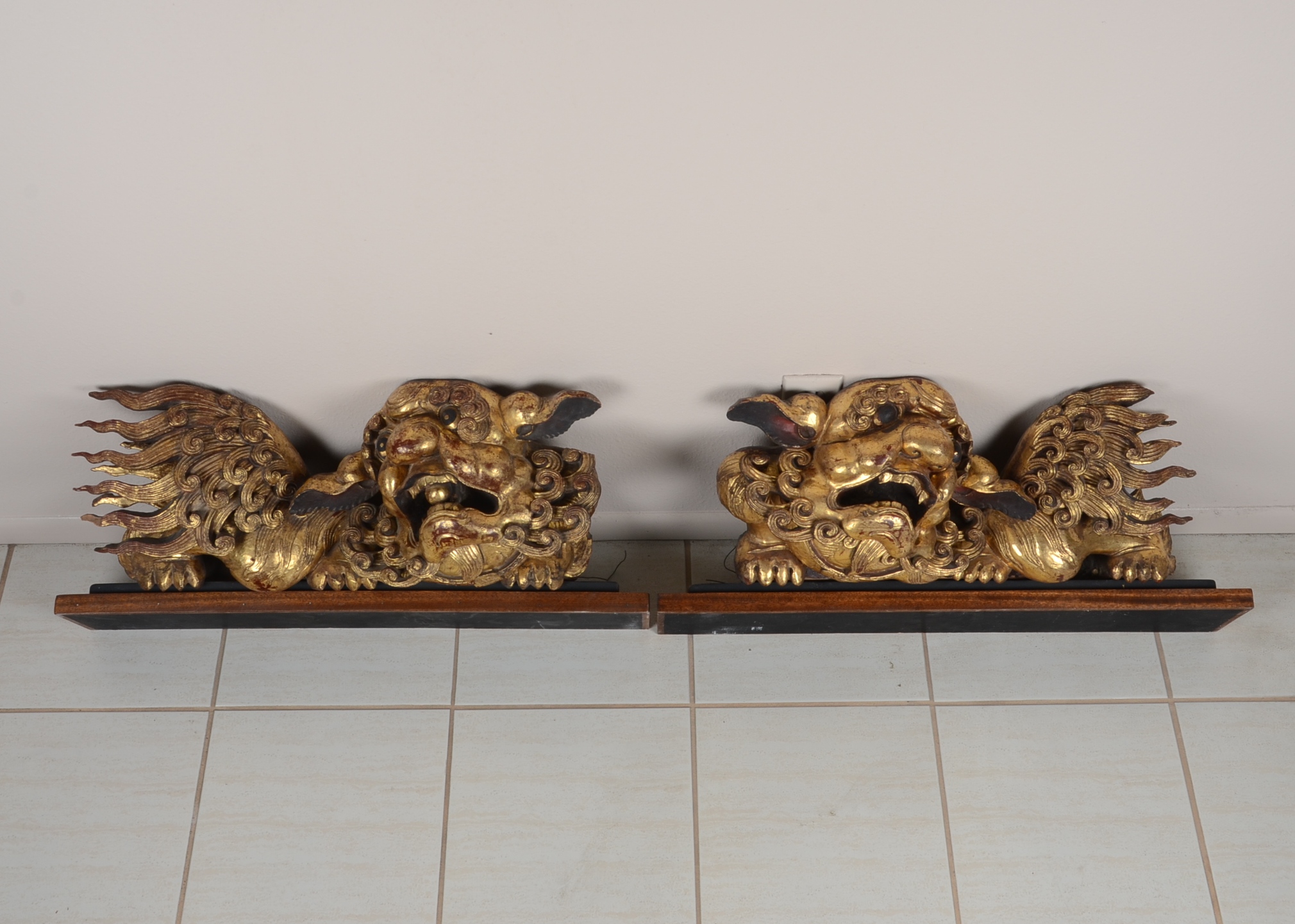 Pair of Gilt Wooden Foo Dogs