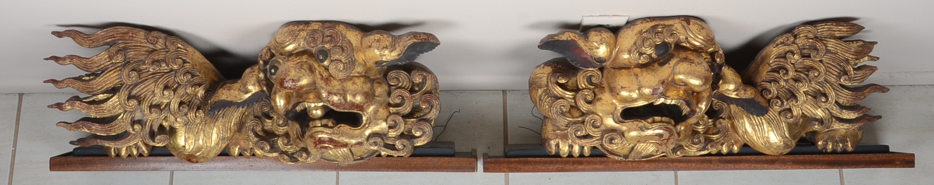 Pair of Gilt Wooden Foo Dogs