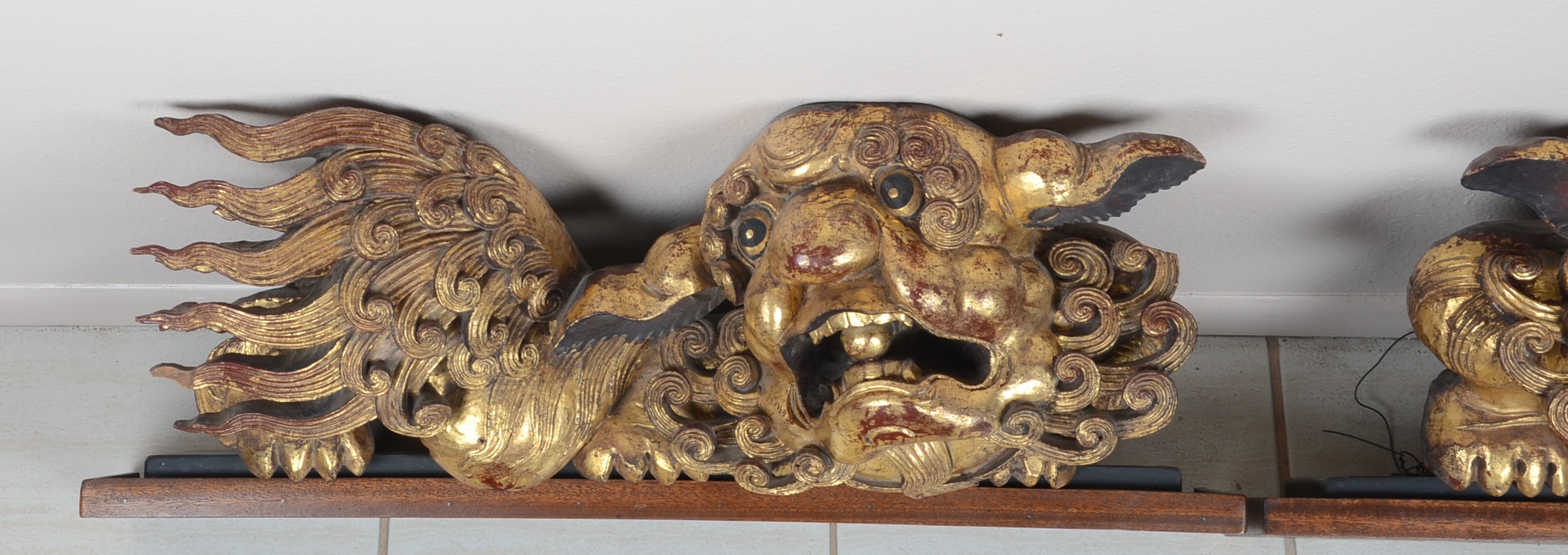 Pair of Gilt Wooden Foo Dogs