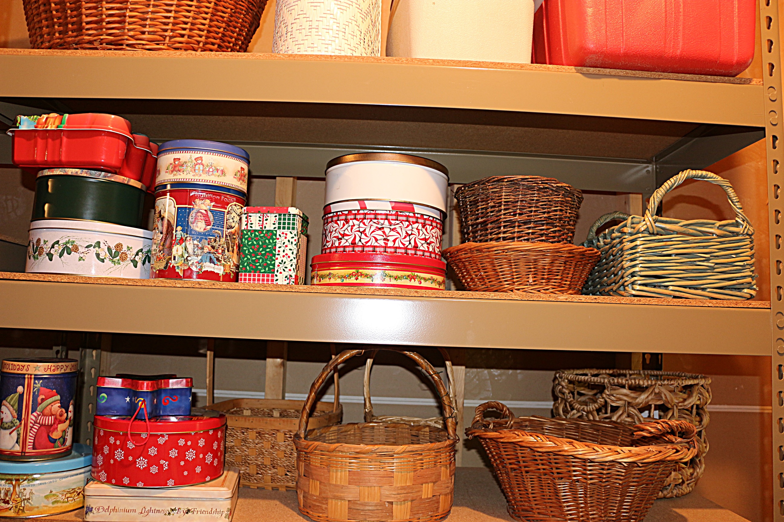 Six Shelves of Baskets and Cookie TIns Group