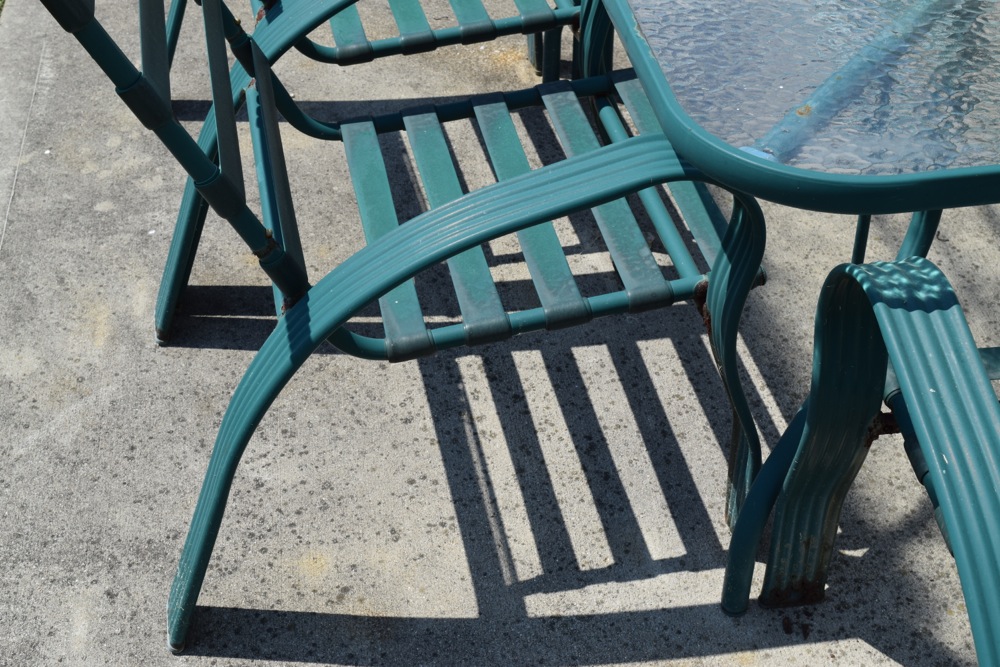 Green Metal and Glass Patio Table and Chairs