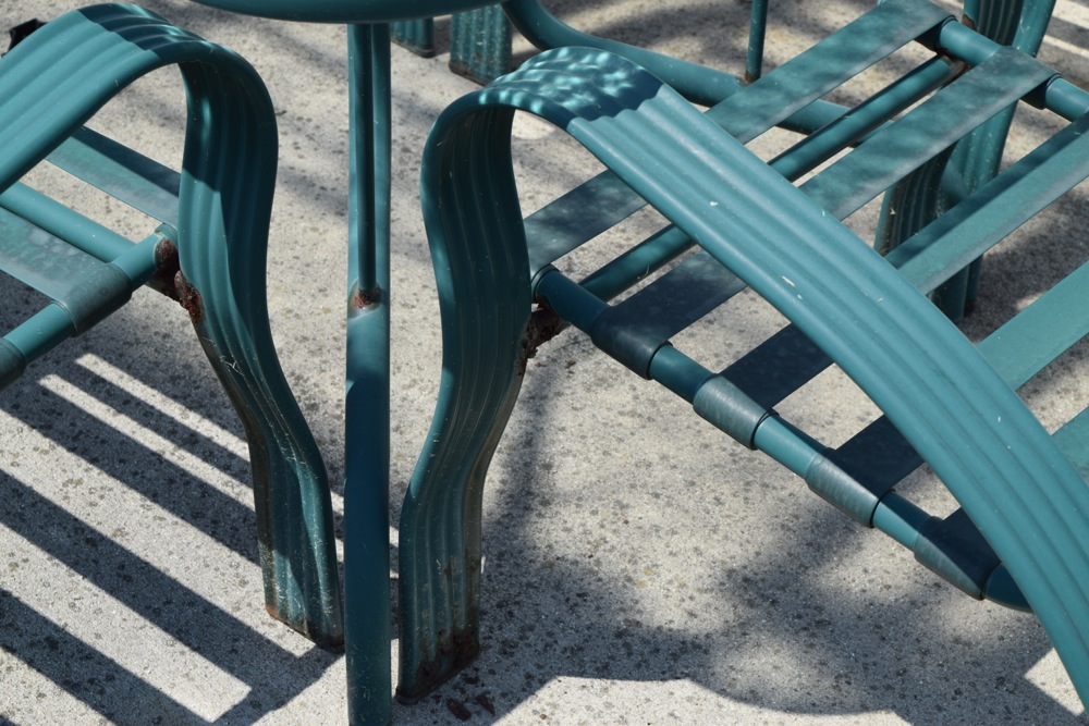 Green Metal and Glass Patio Table and Chairs