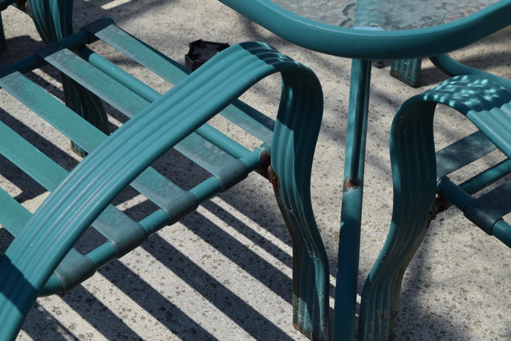 Green Metal and Glass Patio Table and Chairs