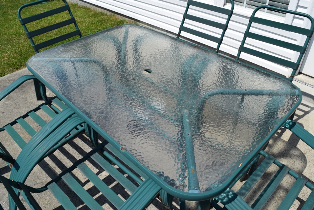 Green Metal and Glass Patio Table and Chairs