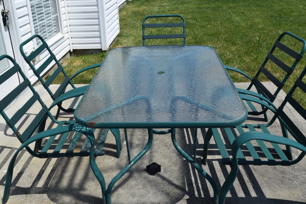 Green Metal and Glass Patio Table and Chairs