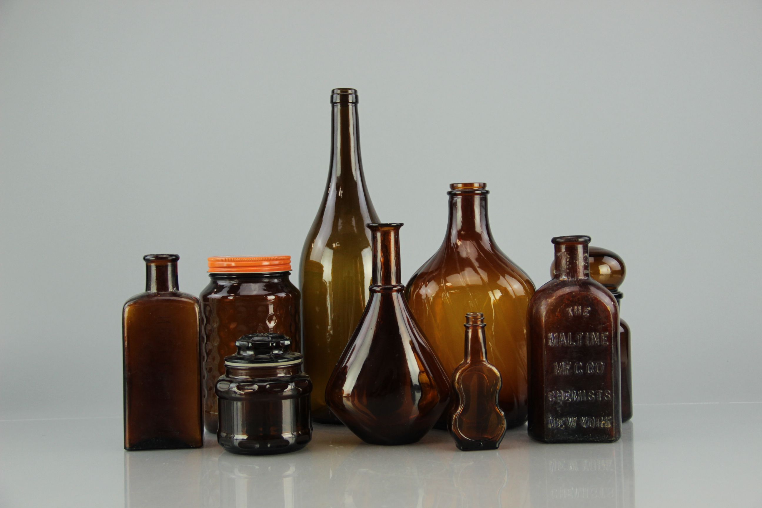Collection of Antique Snake Oil and Other Bottles