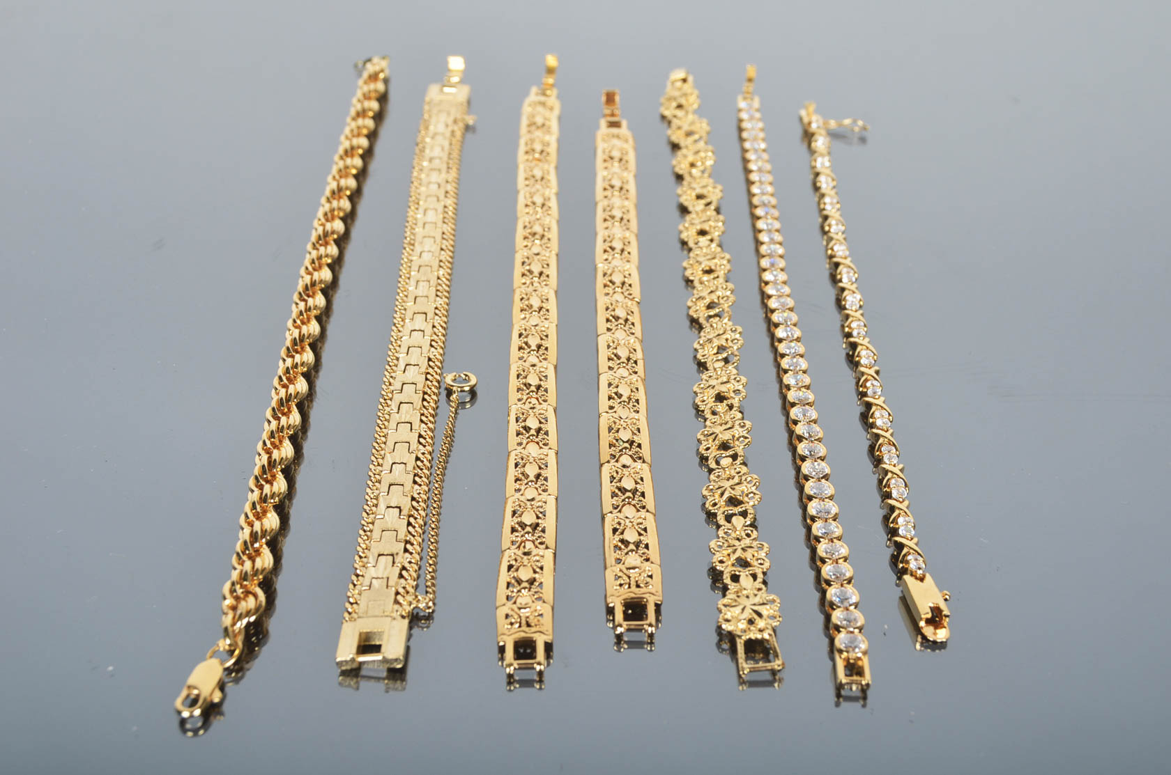 Assortment of Gold Tone Bracelets