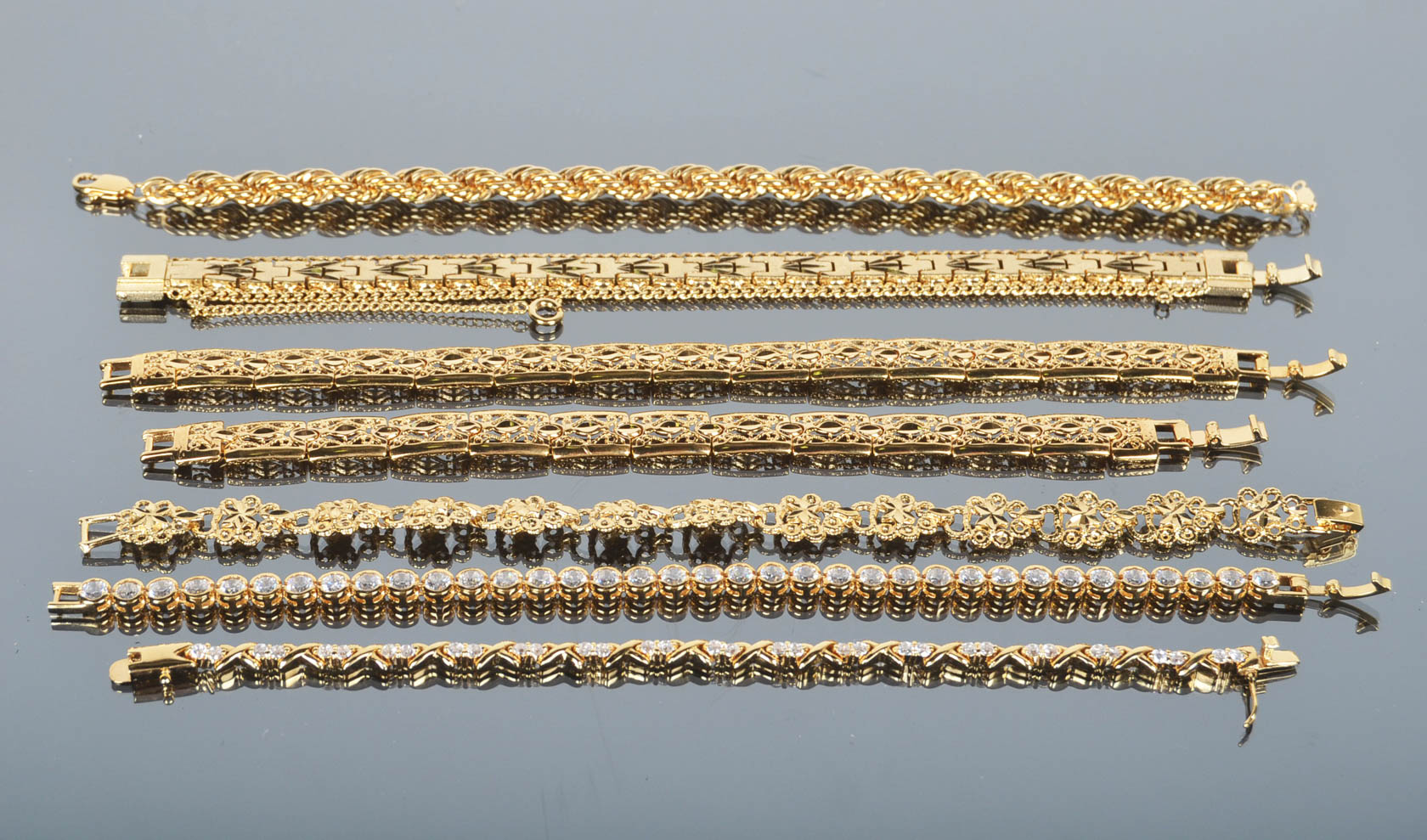 Assortment of Gold Tone Bracelets