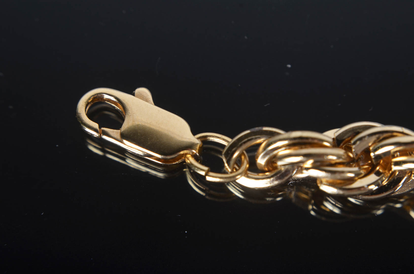 Assortment of Gold Tone Bracelets