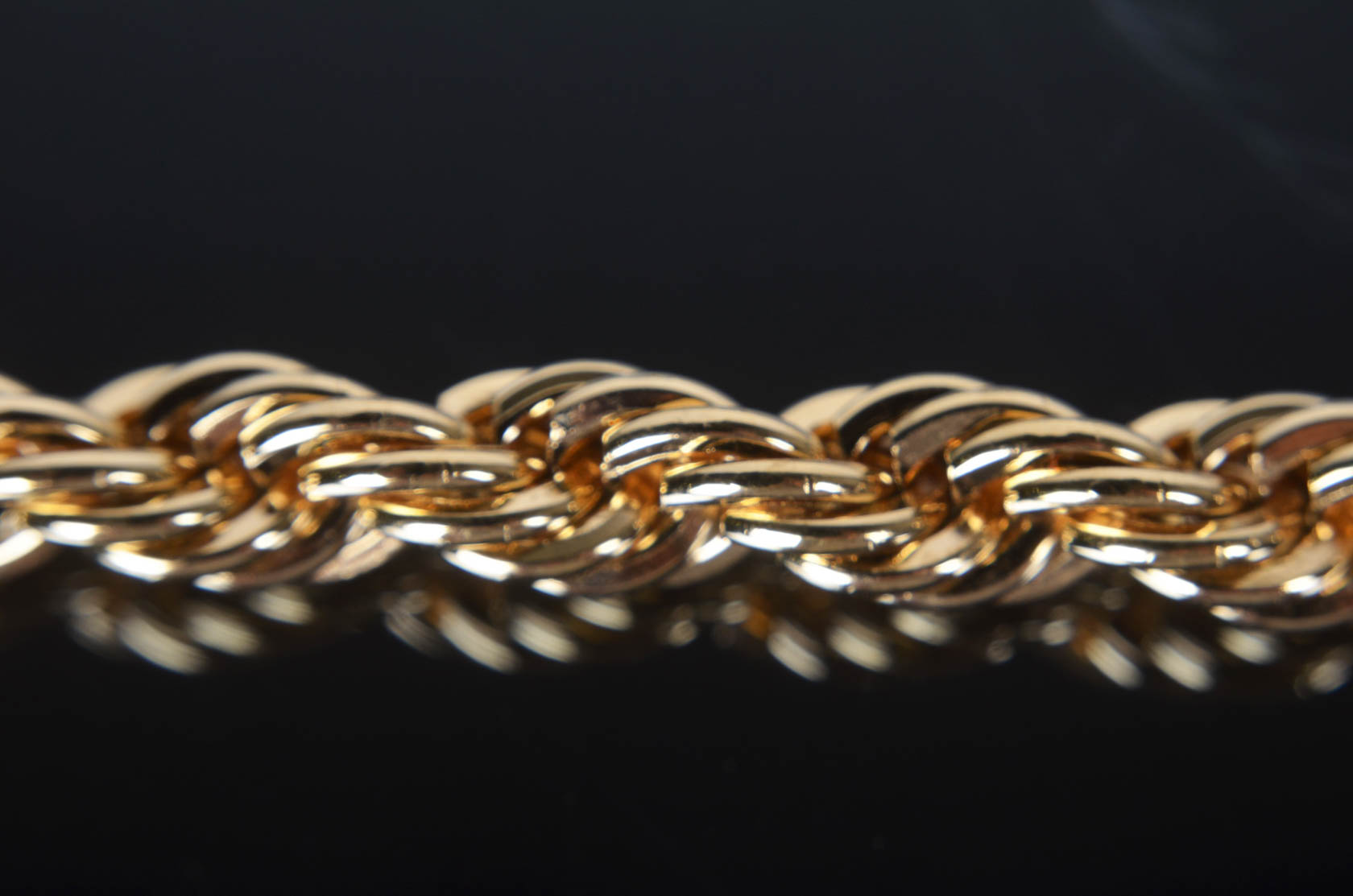 Assortment of Gold Tone Bracelets