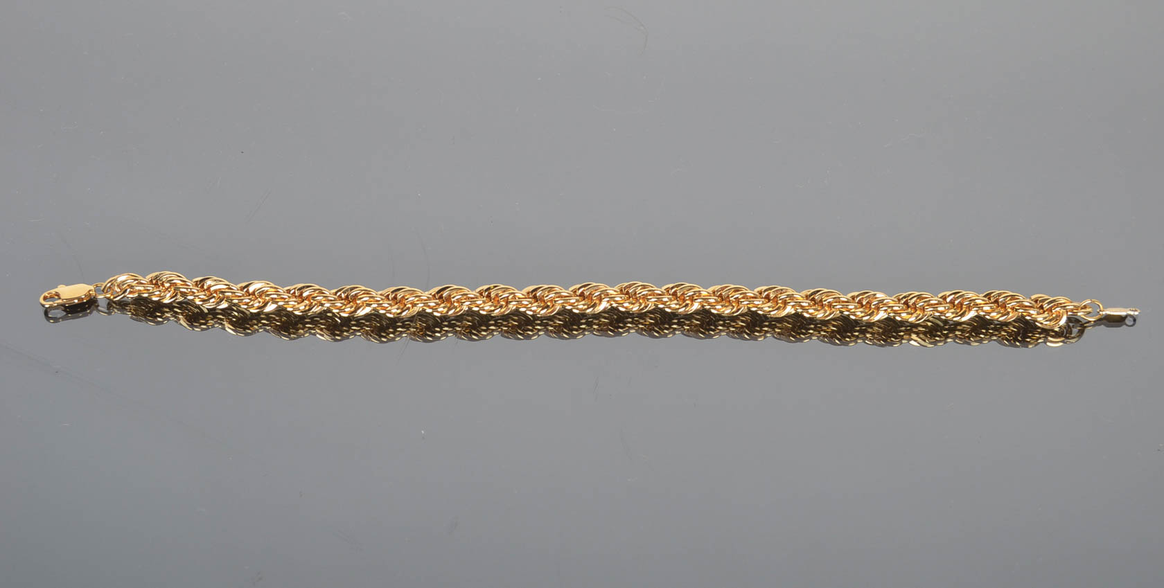 Assortment of Gold Tone Bracelets