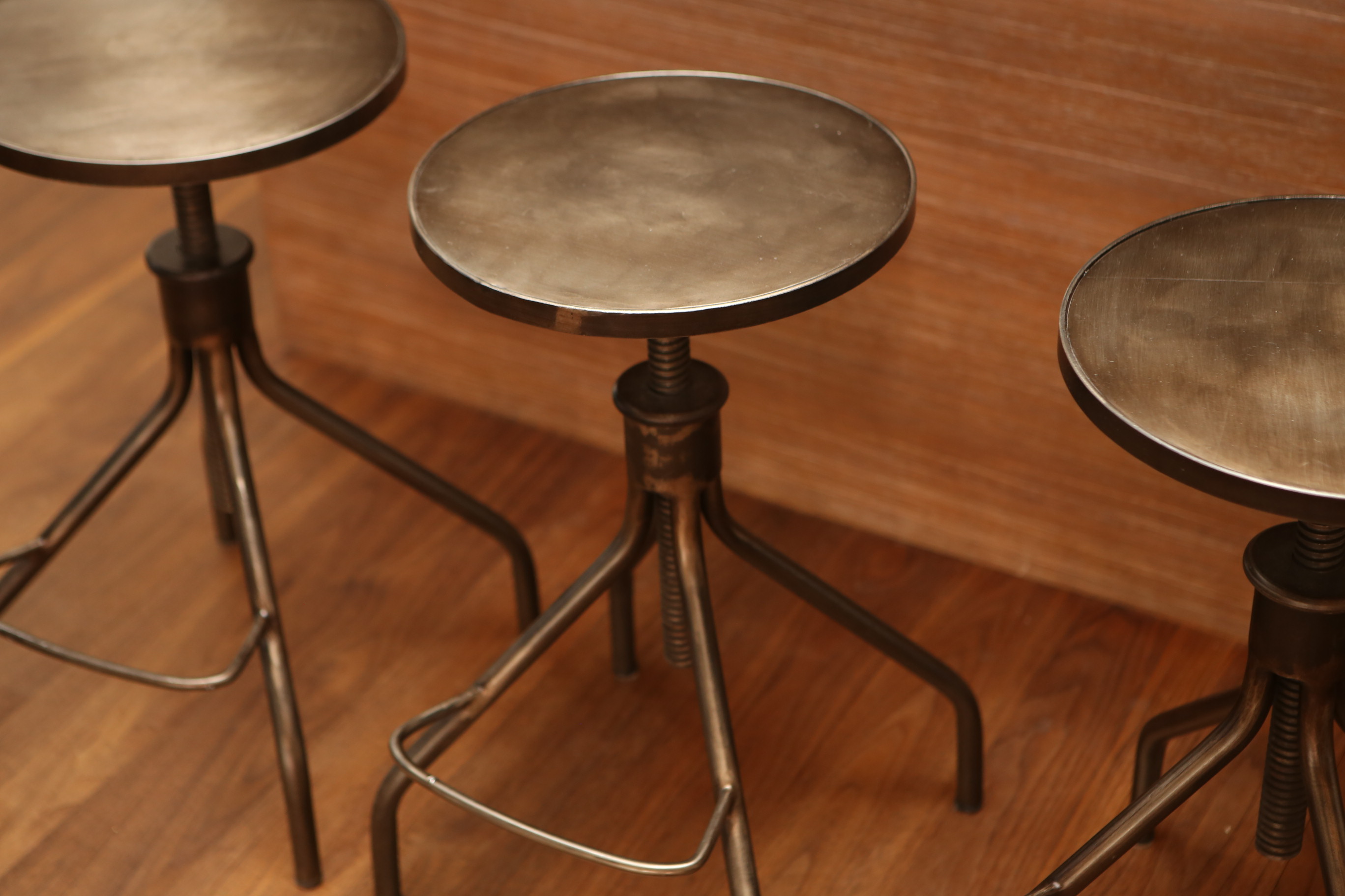 Four Steel Bar Stools from ABC Carpet & Home