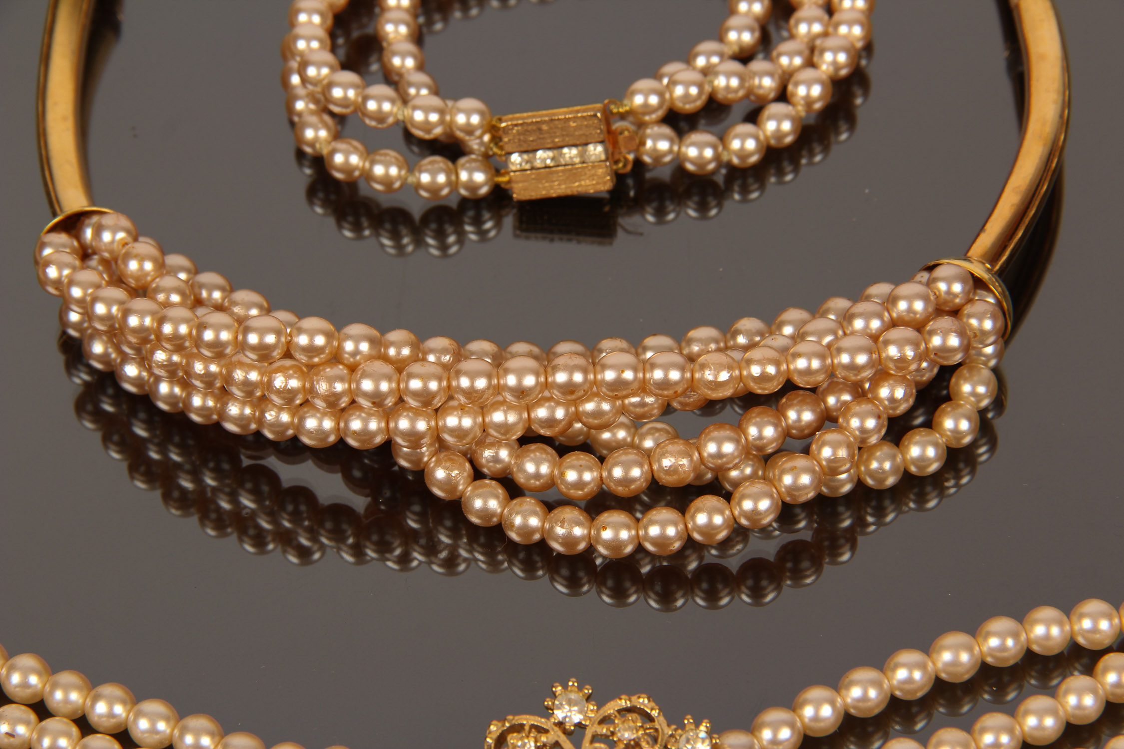 Assortment of Vintage Faux Pearl Necklaces and Bracelets