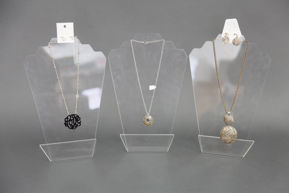 Woman in Red Dripping With Jewelry