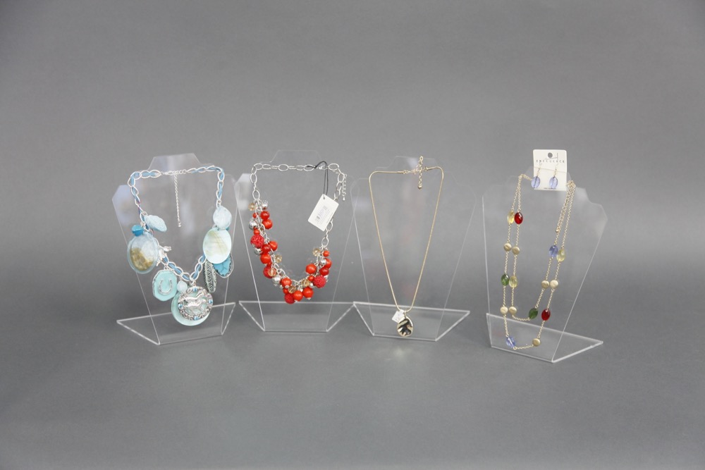 Woman in Red Dripping With Jewelry