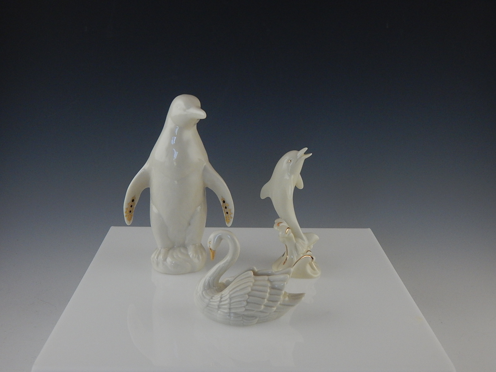 Five Lenox China Figurines- Penquin, Dolphin, Swan, Narwhal, Fish
