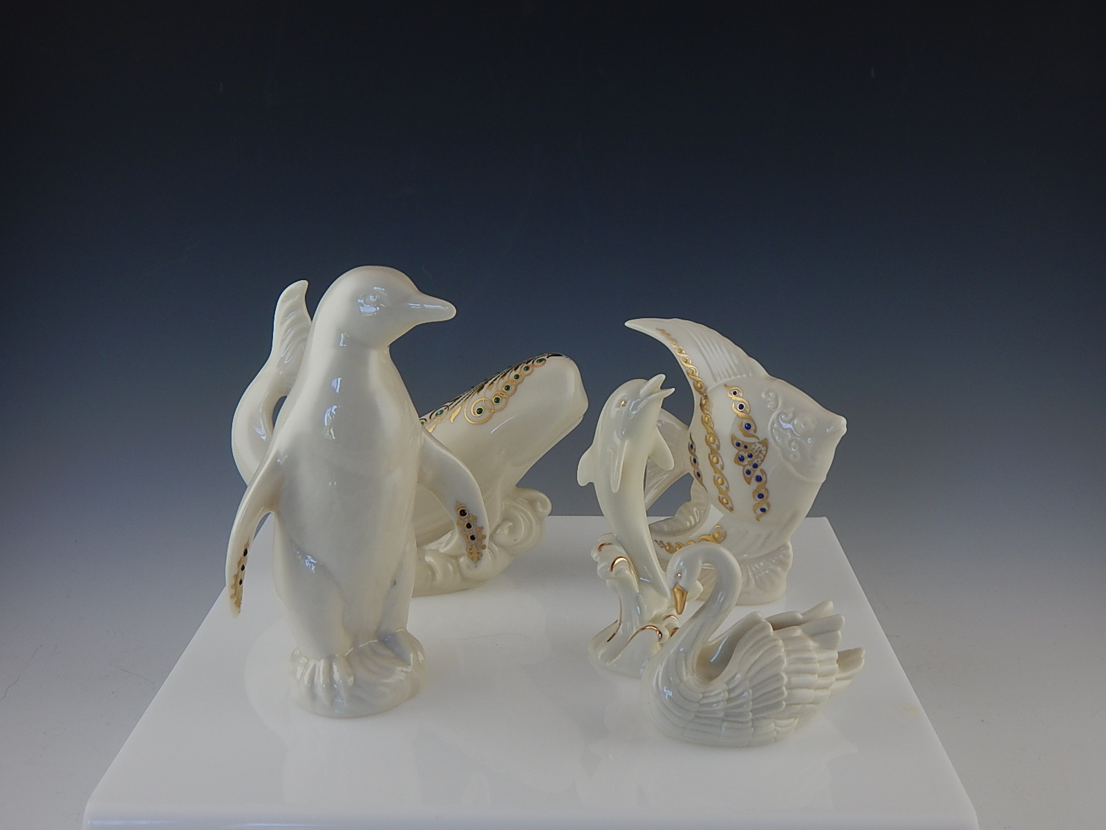Five Lenox China Figurines- Penquin, Dolphin, Swan, Narwhal, Fish