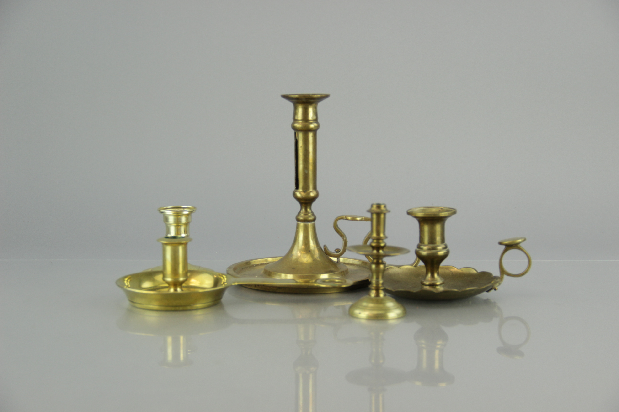 Five Brass Candlestick Holders