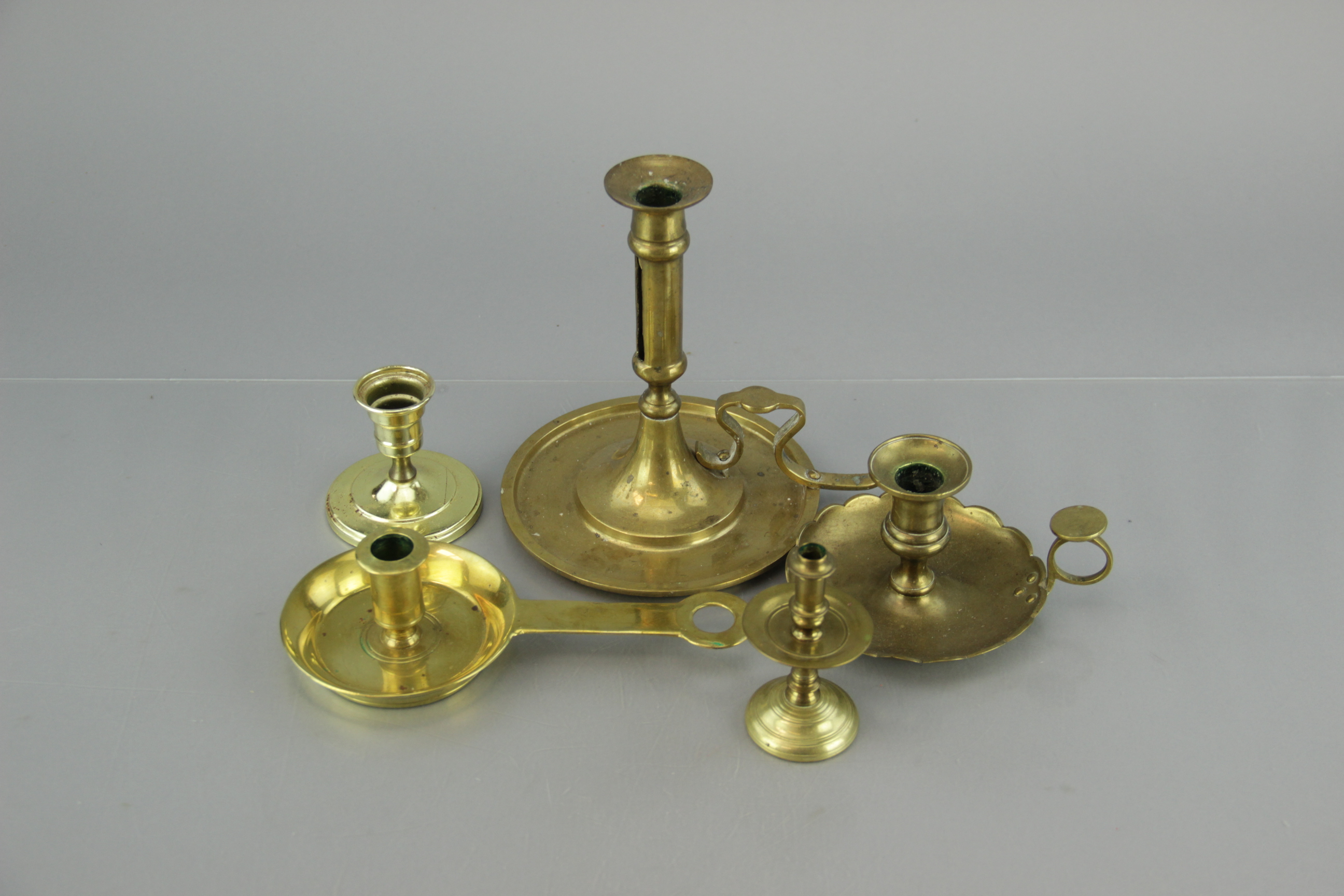 Five Brass Candlestick Holders
