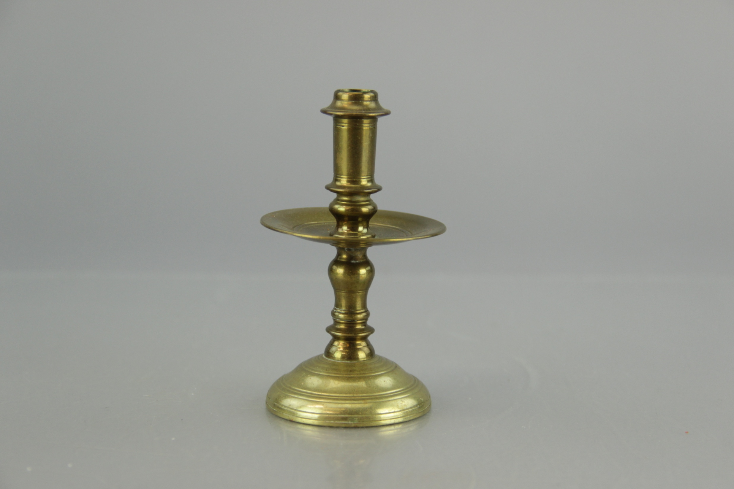 Five Brass Candlestick Holders