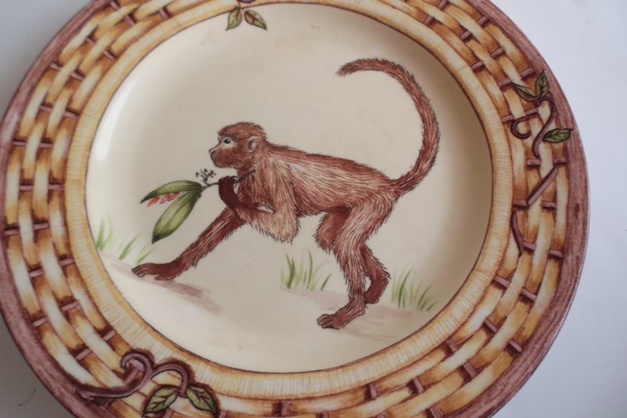 Two Sets of Animal Themed Plates