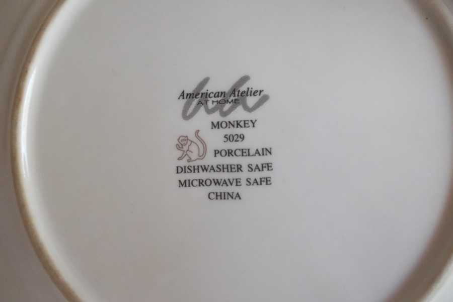 Two Sets of Animal Themed Plates