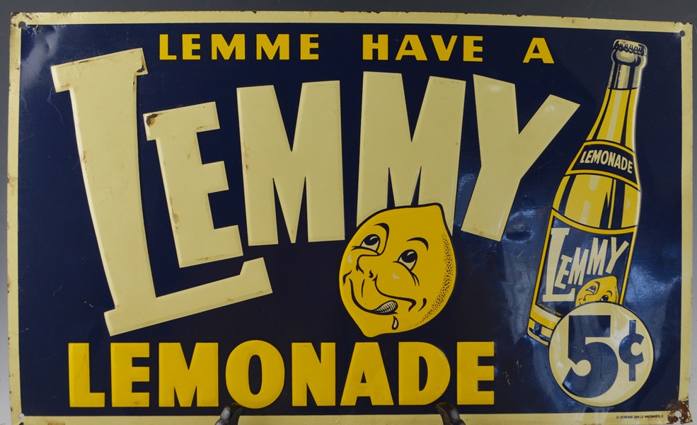 Two Vintage Tin Advertising Signs