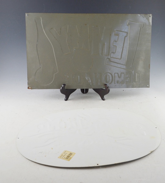 Two Vintage Tin Advertising Signs