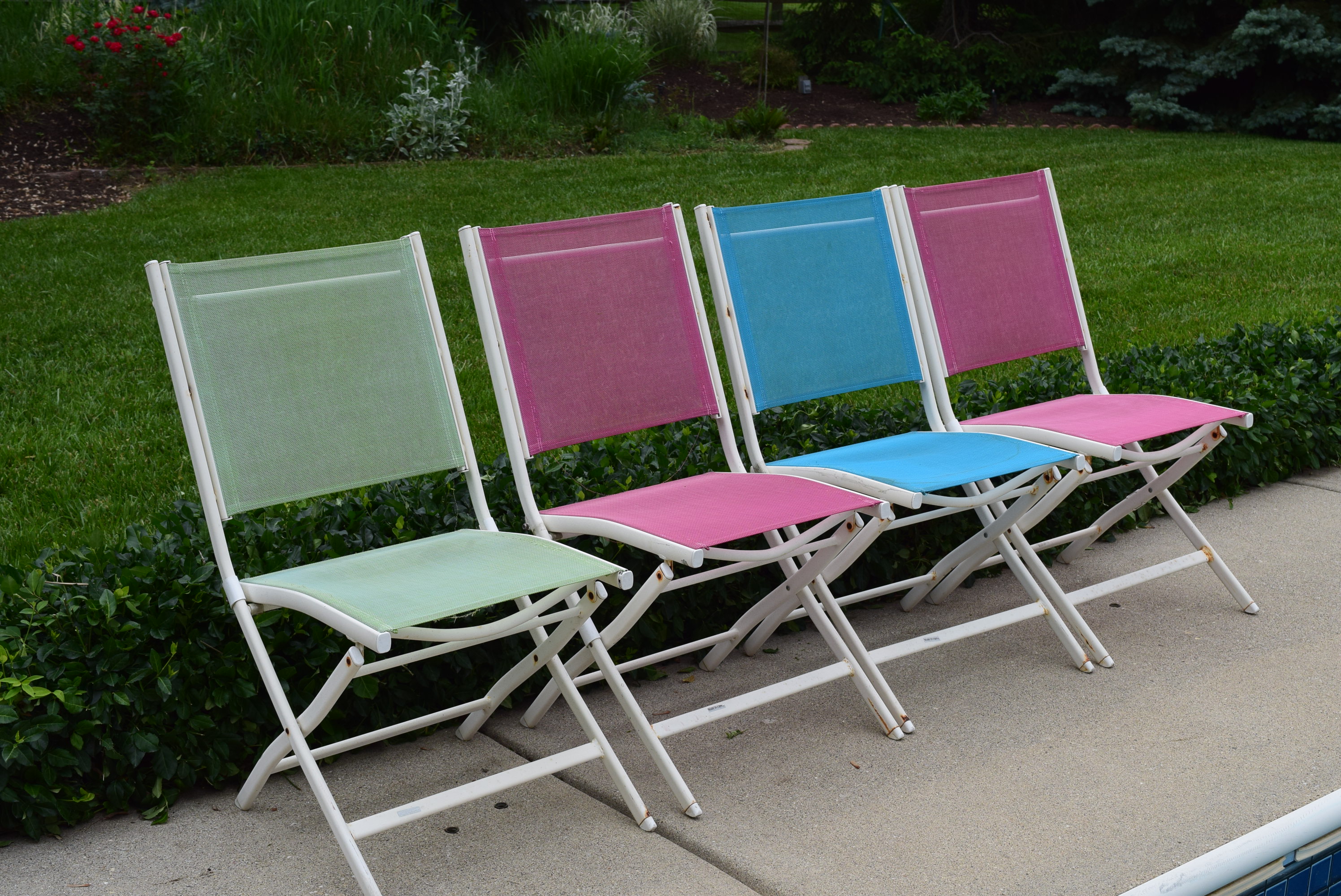 Four Folding Outdoor Mesh Chairs