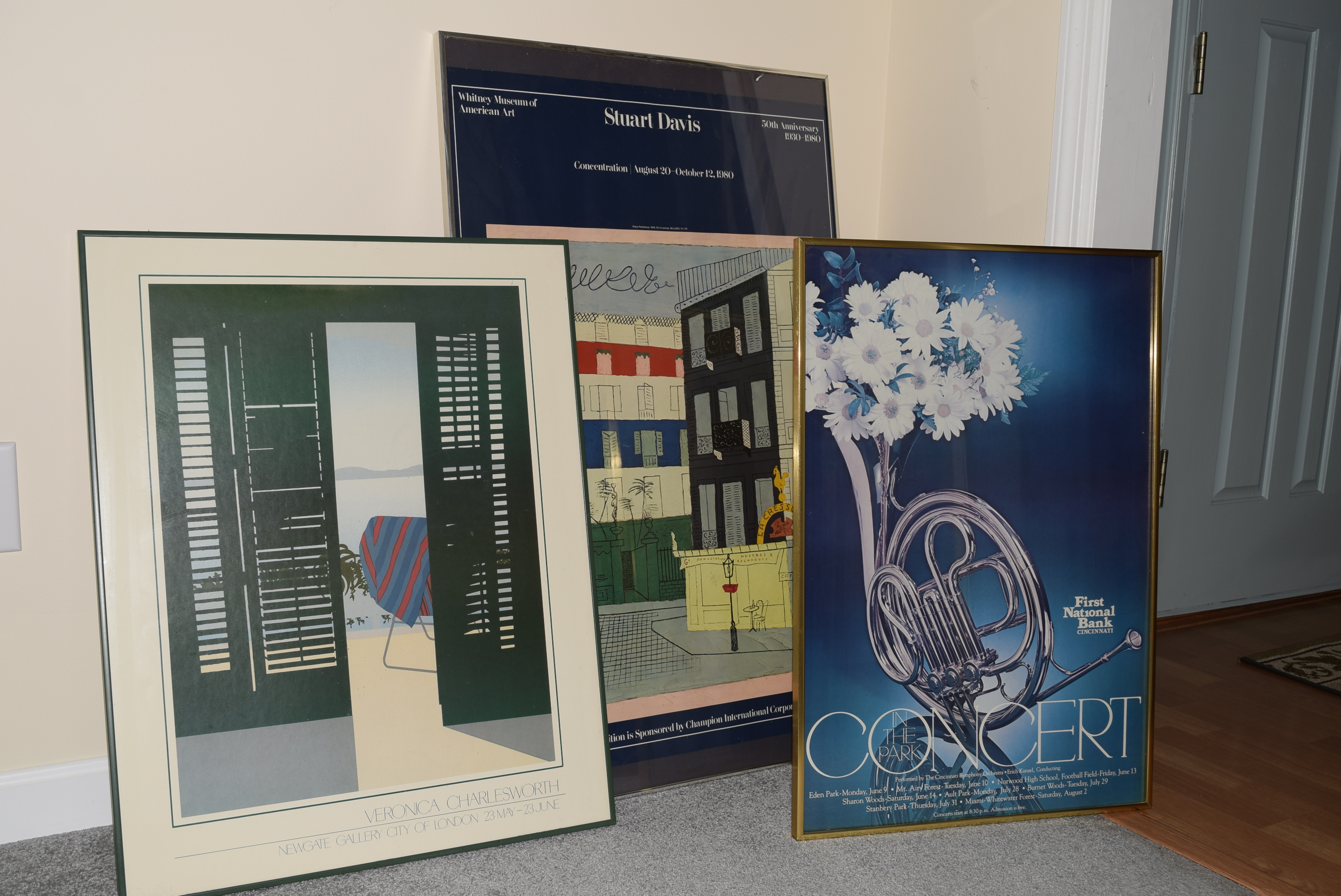 Three Framed Posters of Art Exhibitions and Concert