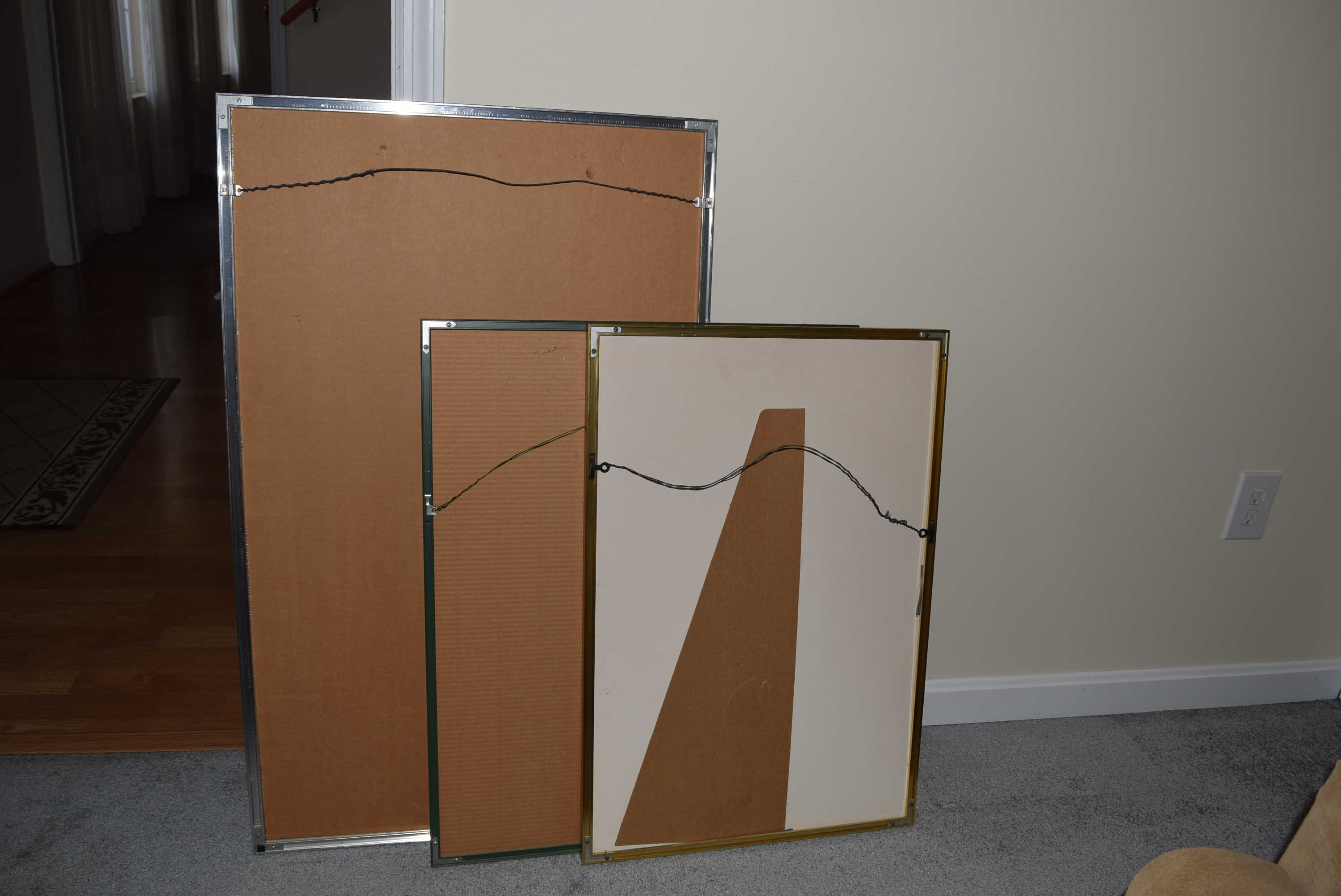 Three Framed Posters of Art Exhibitions and Concert