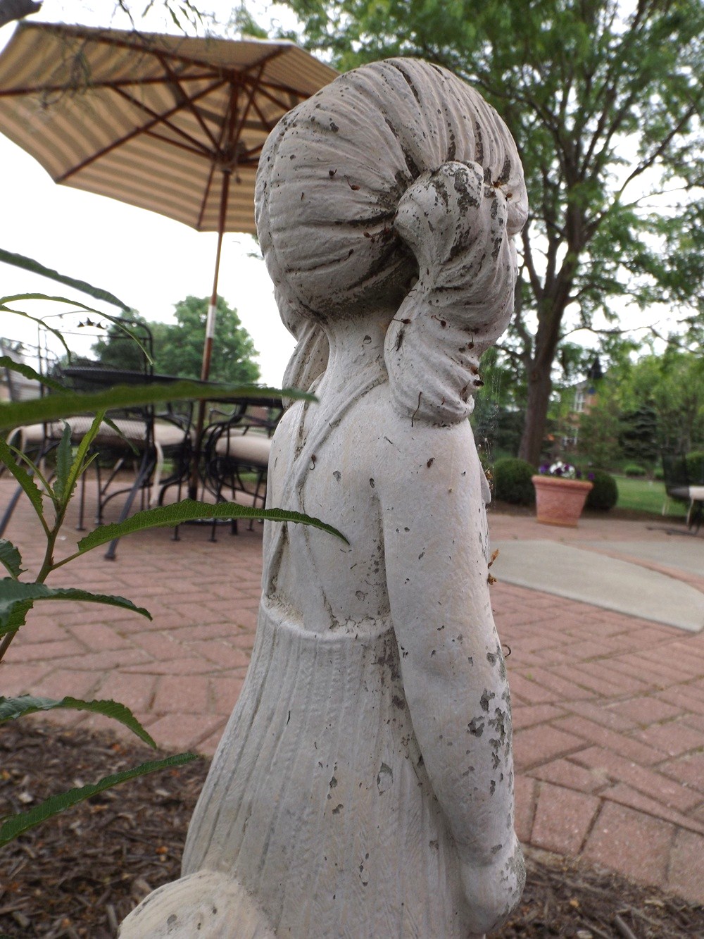 Concrete Garden Statue of a Young Girl