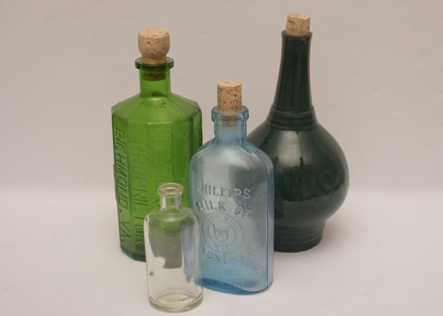 A Set of Four Vintage Bottles